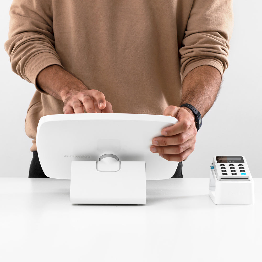 Bouncepad Flip - A secure tablet & iPad tablet stand for POS in white.